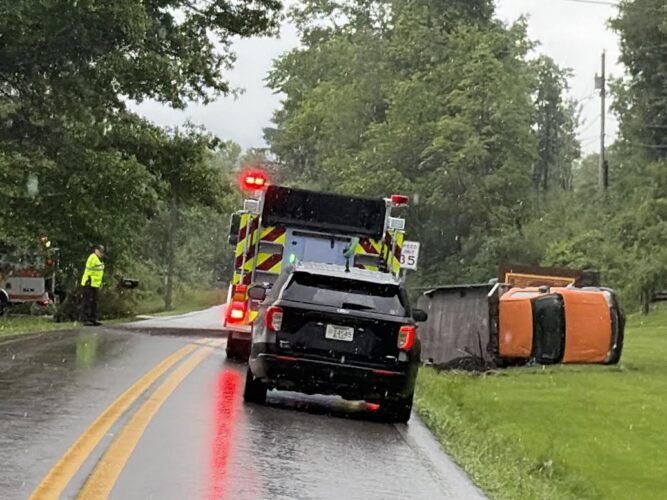 Truck Rolls in the Rain